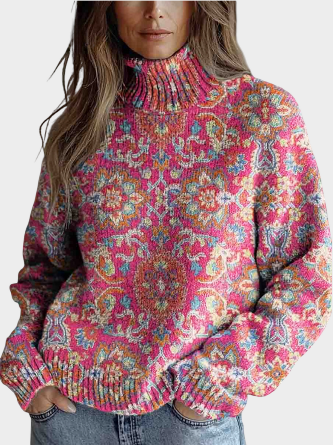 Zane & Inese Rēzija retro floral knit sweater with a high turtleneck, featuring a vibrant pink and multi-color pattern.
