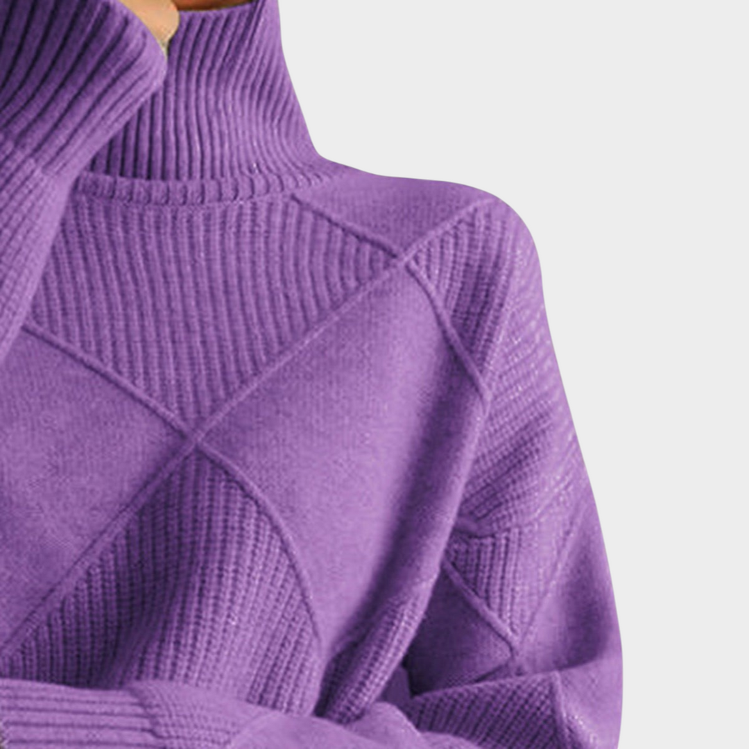 Zane & Inese purple turtleneck sweater featuring a soft knit texture and a modern geometric pattern.