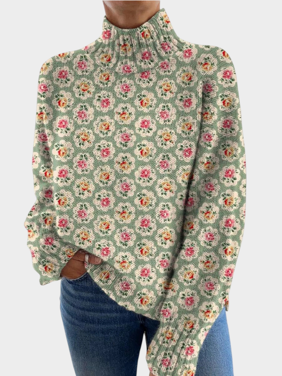 Zane & Inese Linda soft green sweater with a high neck and vintage-inspired pink and yellow floral pattern