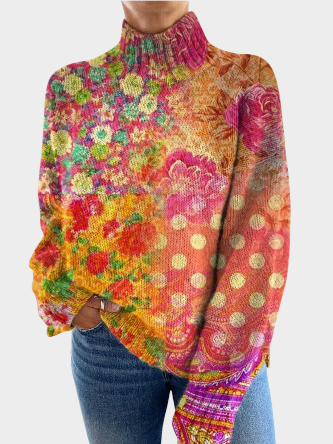 Zane & Inese Juta high-neck sweater featuring a vibrant multicolored floral and polka dot pattern in soft fabric.