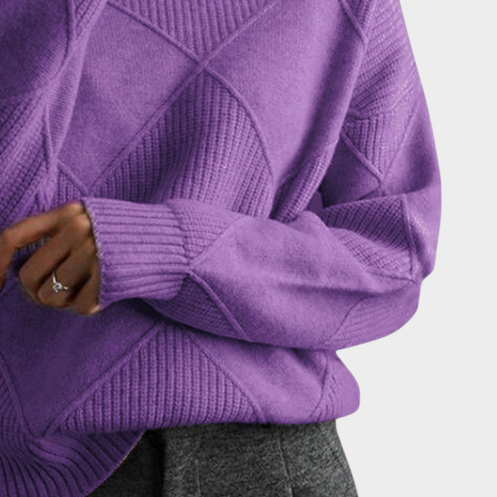 Zane & Inese purple high-neck sweater featuring a soft knit texture and a modern geometric diamond pattern.