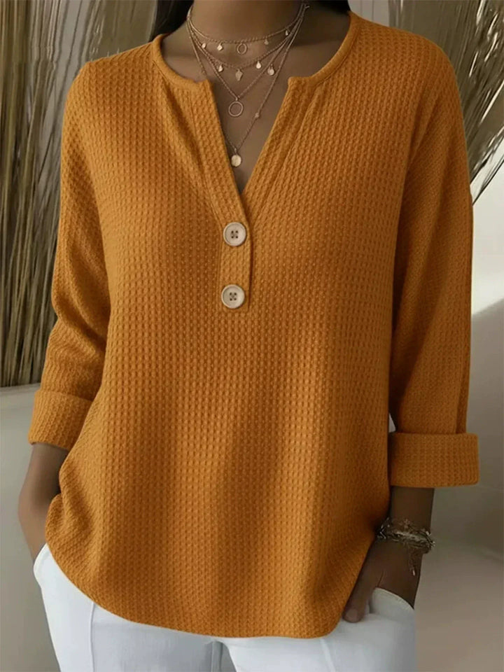 Inta | Tops ar Henley pogām