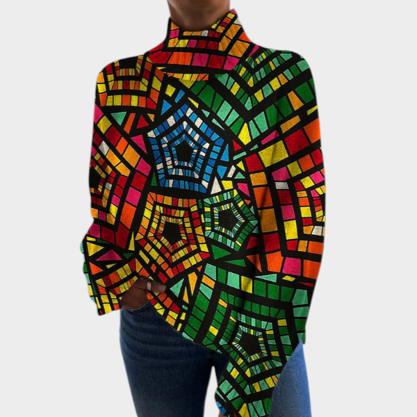 Zane & Inese Emīlija sweater featuring a vibrant multicolored stained glass geometric pattern and high neckline.