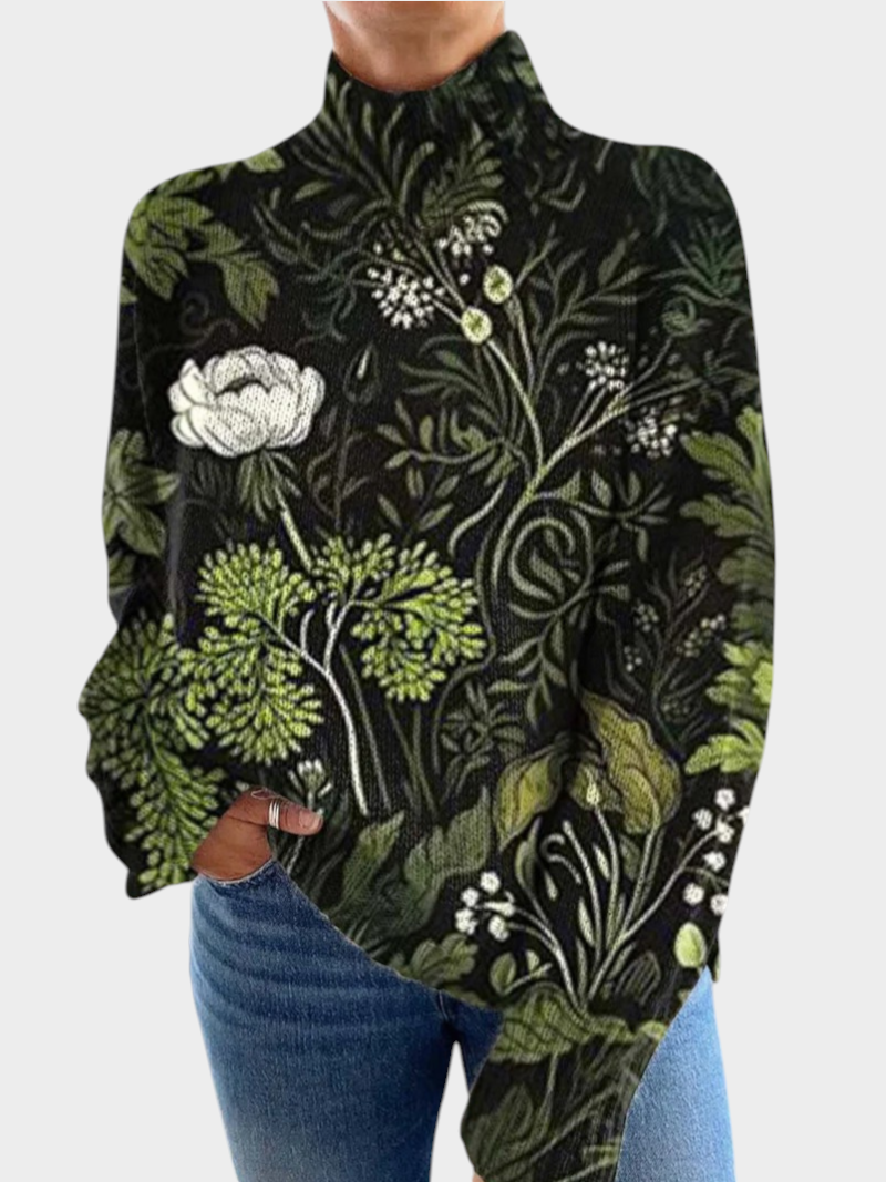 Zane & Inese Agija high-neck sweater featuring a dark green botanical floral print in a soft, comfortable knit.
