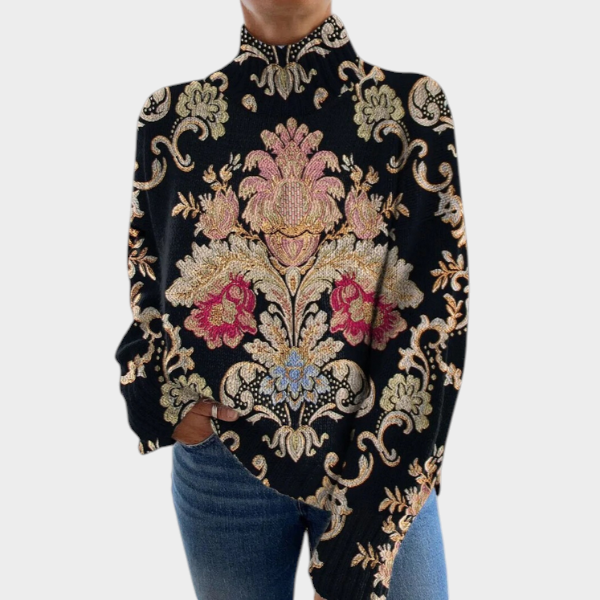 Zane & Inese Krista vintage style black sweater with high neck and intricate floral pattern worn with blue jeans