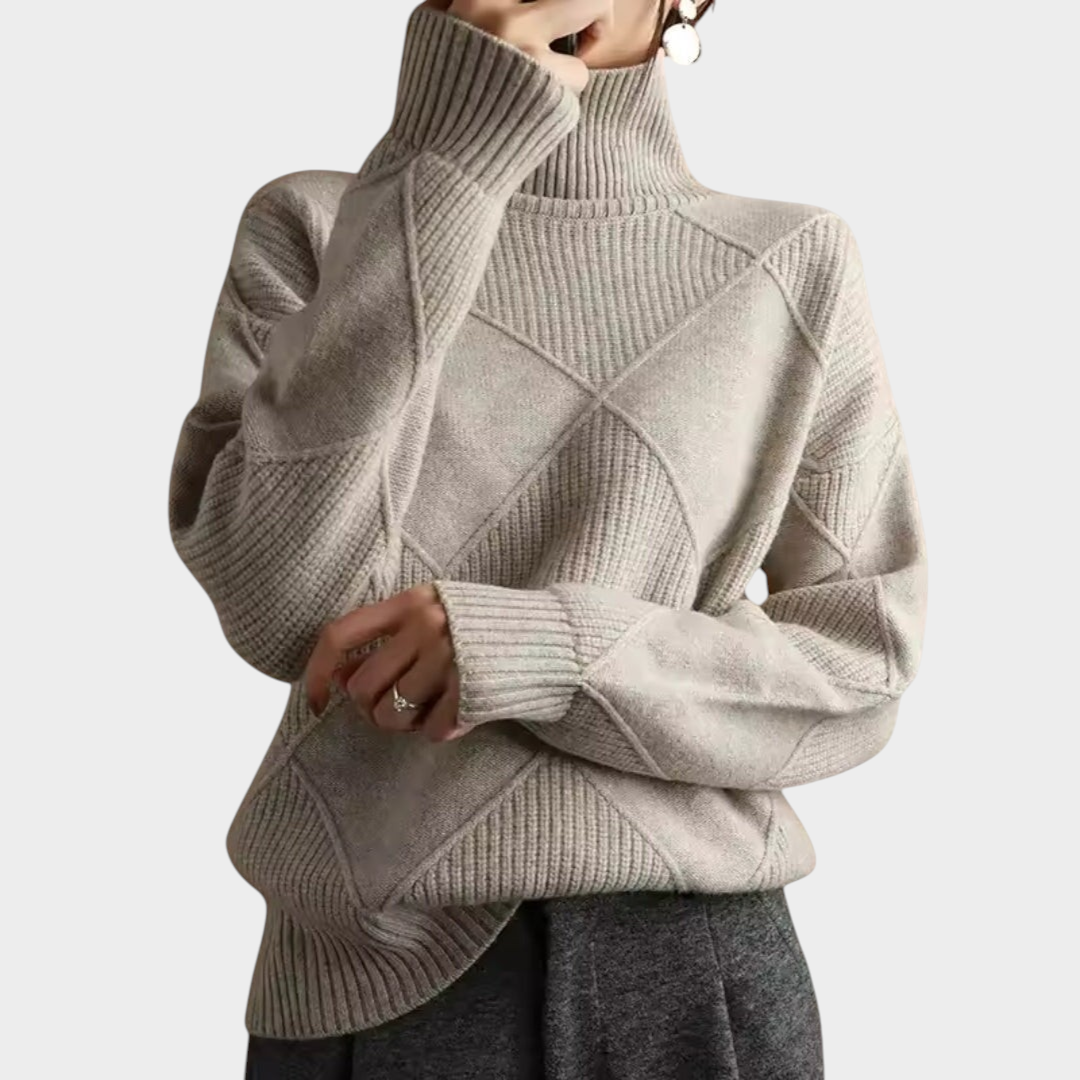 Zane & Inese beige turtleneck sweater featuring a soft knit texture and a modern geometric diamond pattern.
