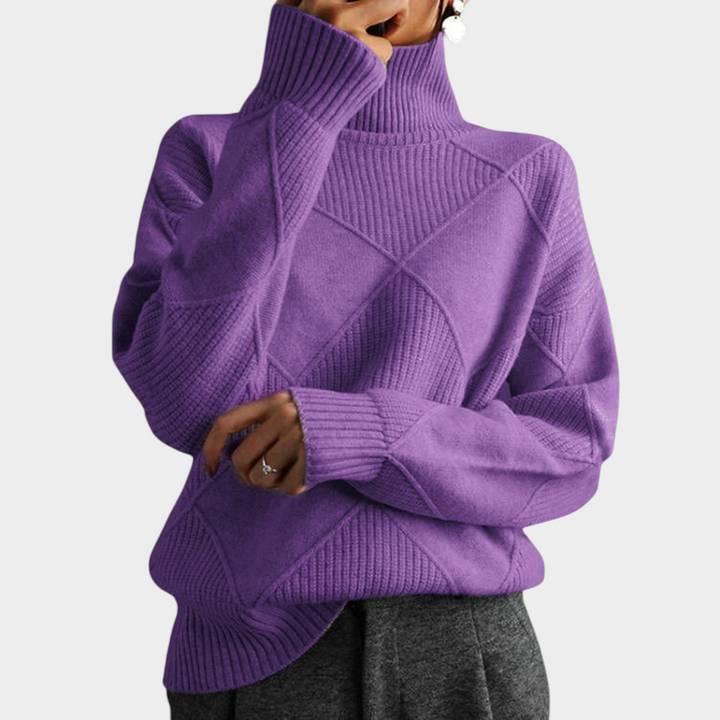 Zane & Inese purple turtleneck sweater featuring a soft knit texture and a modern geometric diamond pattern.