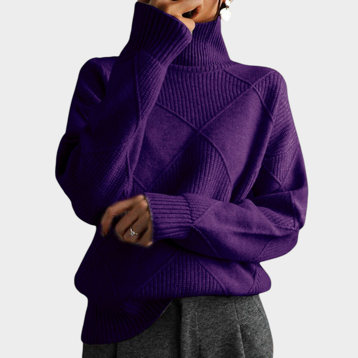 Zane & Inese purple turtleneck sweater featuring a soft knit texture and a modern geometric pattern.