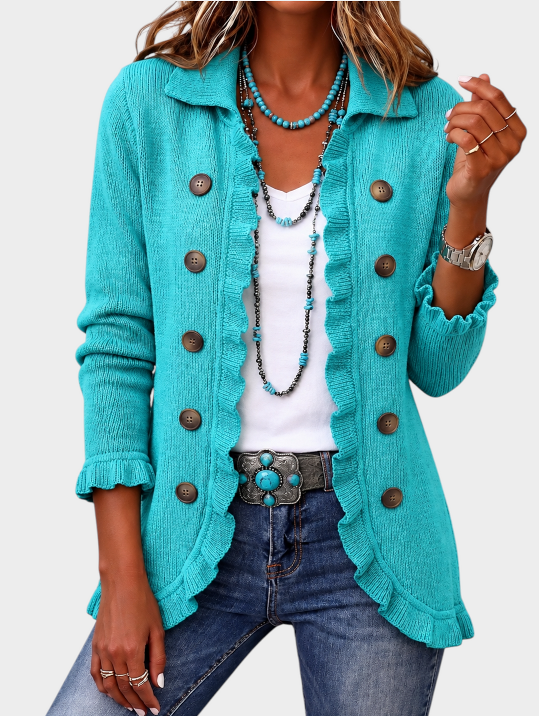 Zane & Inese turquoise ribbed knit cardigan with ruffle trim, double button closure, and collar, worn with jeans.