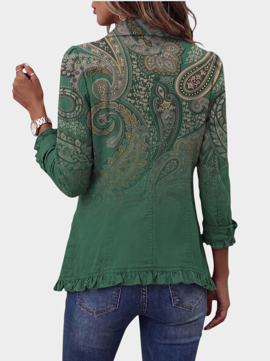 Zane & Inese green paisley print boho jacket with feminine ruffle trim details worn by a woman from the back view.