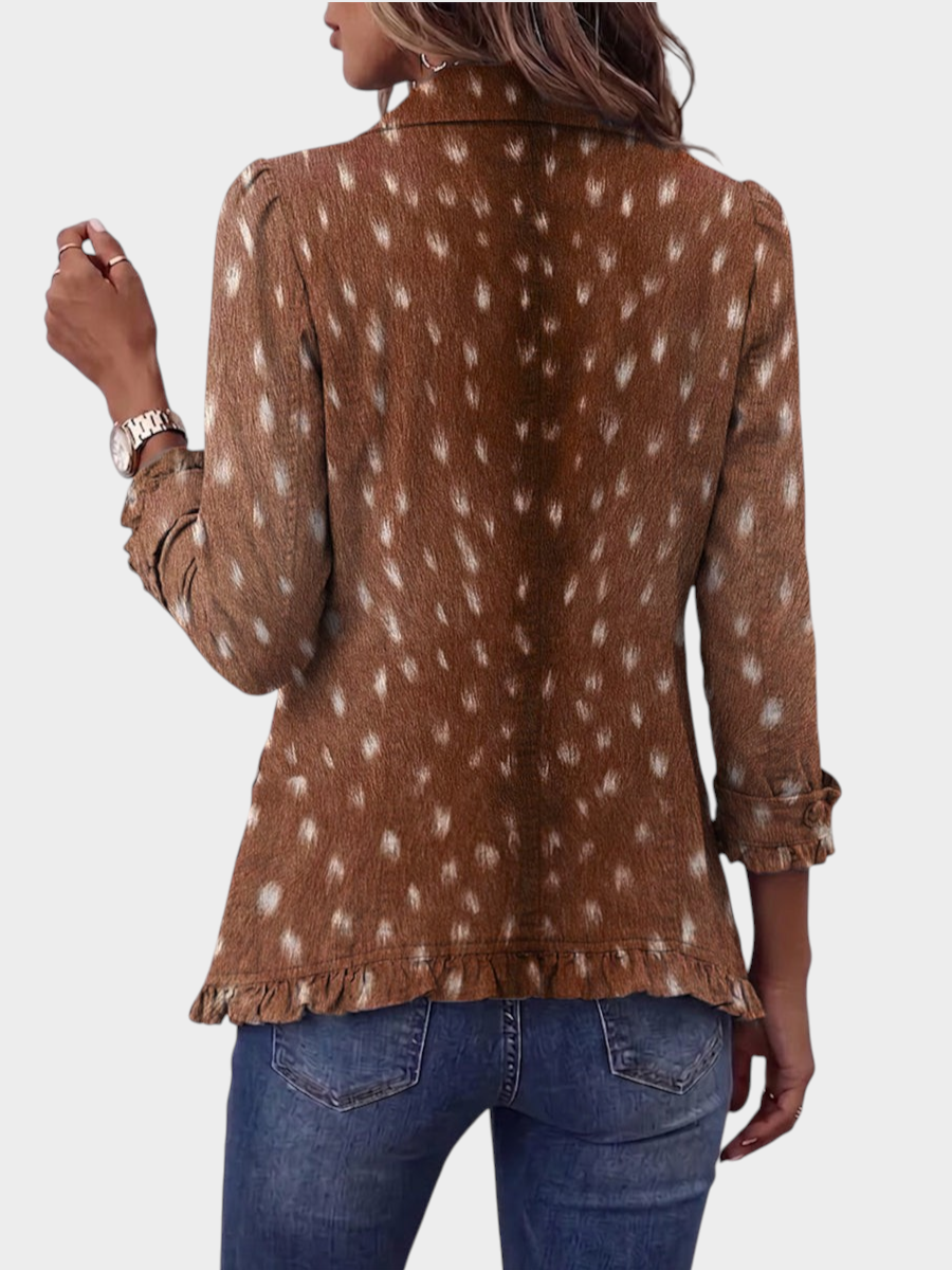Zane & Inese Guna boho jacket in brown with animal print, featuring a ruffled hem and cuffs, back view.