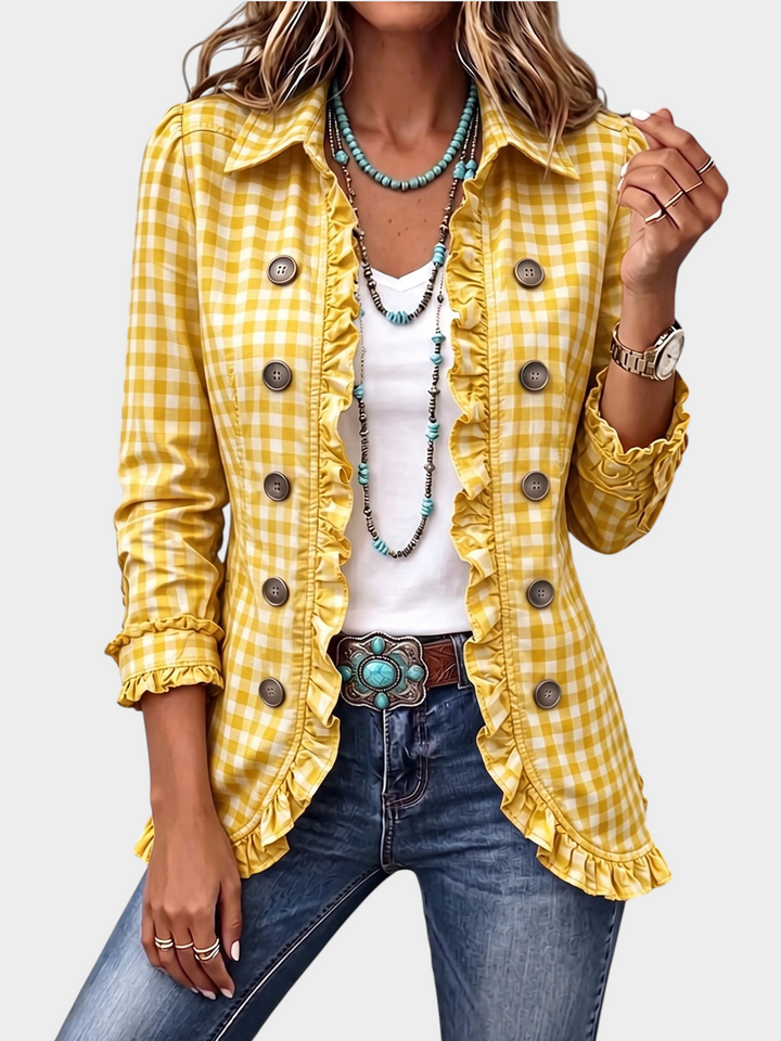 Zane & Inese yellow plaid jacket with ruffle trim, double-breasted button closure, and long sleeves on a model